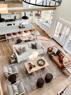 an overhead view of a living room and kitchen