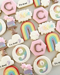 decorated cookies with rainbows, clouds and letters