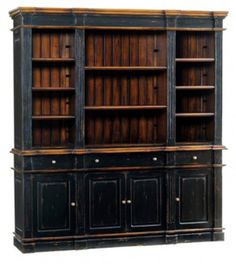 an old black bookcase with two doors and drawers on the front, against a white background