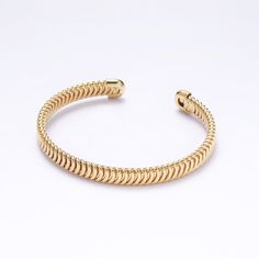 The must-have bracelet of the season, these textured gold-filled bangles are the epitome of luxury and versatility. Whether stacked or worn alone, the combination of texture and shimmering gold make these bracelets the perfect accessory to create a bold statement. Designed to wrap around your wrist and fully customizable. 1 bracelet per order. Adjustable Gold Wrap, Bold Jewelry, Gold Texture, Gold Filled Jewelry, Wrap Around, Simple Outfits, Wrap Bracelet, Gold Filled, Gold Bracelet