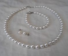 "PREFERENTIAL POLICIES : The order is $25 or more.There will be a 10% discount.long-term effective. Please use the coupon code: CZH10 Welcome back to my shop: https://www.etsy.com/shop/pearlandjewelry Description of the product in the picture: I make the pearl sets to use 8mm Pearl white shell pearls, metal clasp and sterling silver post. .They are necklace bracelet and stud earring . The necklace lengh is 18 inches,The bracelet lengh is 8 inches. If you need different lengths.( necklace lengh: Pink Pearl Necklace, Earring Wedding, Pearl Earrings Wedding, Pearl Jewelry Wedding, Bracelet Pearl, Pearl Jewelry Sets, White Pearl Necklace, Prom Jewelry, Necklace Wedding