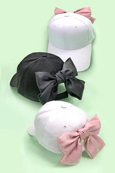 Our Big Bow Ribbon Baseball Hat Cap, a fashion-forward twist on the classic baseball cap. This head-turning accessory features a generously sized bow ribbon that adds a touch of glamour and style to your casual look. Crafted with attention to detail and a commitment to comfort, this cap combines practicality with a statement-making design. The oversized bow adds a playful yet chic element, making it a versatile piece for various occasions. Adjustable strap and buckle for a comfortable fit on every headDIMENSION:Height: 4.75"Brim: center 3" Circumference: 22"Adjustable strap in the backMaterial: 100% Polyester Tie Up Shirt, Tie Up Crop Top, Crop Top Short Sleeve, Hat Types, Sunglass Chain, Bow Ribbon, Faux Leather Belts, Fabric Bows, Big Bow