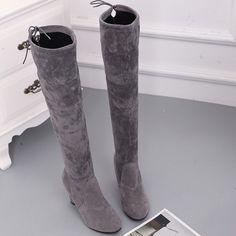 Looking to attract attention? You will certainly make a statement with these stunning over the knee high boots. With their cute unique tie up back design you are sure to turn heads. Glamorous and a bit risque' you will get noticed walking into a room with these gorgeous over-the-knee skinny boots. Super soft and comfortable they are made of quality Suede PU leather and feature round toe pull on design with tie closure and seam detailing Elegant and stylish they sport a slightly thicker heel maki Thigh High Heels, Buy Boots, Pointed Toe Boots, Wedge Ankle Boots, Leather High Heels, Womens Knee High Boots, Buy Shoes, Thigh High Boots, High Heel Boots