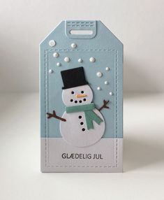 a card with a snowman on it