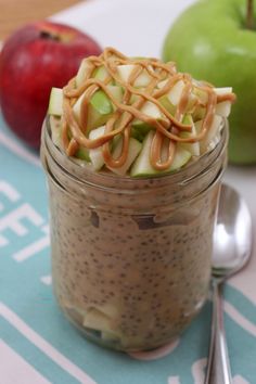 an apple pie in a jar with spoons