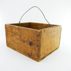 an old wooden box with handle on white background