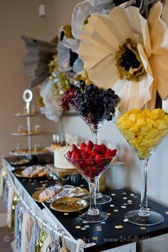 an assortment of desserts on a buffet table