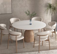 a white table with six chairs around it