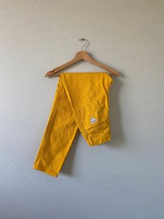 "Stunning yellow-colored vintage high-waisted Palmetto jeans from the 80s with standard zip fly and pockets. In good vintage condition. Measurements taken while item is laid flat. Measurements: waist: 24\" hips: 26\" length: 40\" inseam: 29.5\" rise: 11\" Tag size: 7 Fabric: 100% Cotton Made in USA" High Waisted Jeans Vintage, Vintage Calvin Klein, Monochrome Outfit, Vintage Levis Jeans, Cute Tank Tops, Vintage Fits, Jan 11, Womens Jeans, The 80s