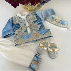 "With these clothes that will create the style of your boy, you can make your child stylish with these clothes for daily or special occasions. For more kids' clothes from AymiraDesign, check out our \"baby boy clothes\" category. ✿ Product Features; ✰ Baby Dress Materials: Cotton Satin, Lace ✰ Baby Dress Color: Blue&White ✰ Set Content: Pants, Shoes, Hats, Jackets, Shirt ✰ Size Options: * 0-3 months, 3-6 months, 6-9 months, 9-12 months, 12-18 months, 18-24 months, 2T, 3T, 4T, 5, 6 US kids' numeric ✰ Note: Shoes are US children's figures up to 12 months. There are no shoes for older age groups. More from Baby Girl Dress Collection: https://etsy.me/3VtBjgu More from Newborn Baby Clothes: https://etsy.me/3rJyzh9 ❤️ Find more to here:  AymiraDesign.etsy.com ✿ PACKAGING: * All of our products w Customizable Fitted Sets For Baptism, Toddler Clothes Boy, Victorian Birthday, Birthday Baby Boy, Baby Lace Dress, Arabic Clothing, Toddler Baby Boy, Boy Baptism Outfit