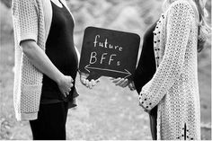 black and white photograph of two pregnant women holding a sign that says future bbfs