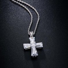 Love the New Elegant Cubic Zirconia Cross Necklace? Sometimes You Never Know The True Value Of A Moment Until It Becomes A Memory. And then you have this beautiful piece of jewelry to remind you of that special moment wherever you go. When was the last time you treated yourself to a lovely gift that reminds you of the most important events in your life? Carry your cross every day and remember what true love looks like. The New Elegant Cubic Zirconia Cross Necklace is carefully crafted with coppe Mother's Day Cubic Zirconia Pendant Jewelry, Anniversary Cross Pendant Necklace With Cubic Zirconia, Crystal Cross Pendant Clavicle Chain, Crystal Clavicle Chain With Cross Pendant, Fine Jewelry Cubic Zirconia For Anniversary Gift, Crystal Cross Clavicle Chain Jewelry, Crystal Clavicle Chain With Cross Shape, Fine Jewelry Cubic Zirconia For Anniversary, Crystal Cross Clavicle Chain