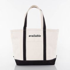 Our classic Canvas Boat Tote in medium is a staple for any tote-bag lover. Features a top zip enclosure, self-constructed canvas handle in contrasting trim color, internal pocket organizer with zippered enclosure and a spacious interior with a flat bottom.  The text and trim color is as shown only. Care instructions- In order to make the most of the extended use of this product, the manufacturer strongly encourages customers to prep the canvas, jute, and cotton-linen blend products by spraying t Rectangular Canvas Bag With Reinforced Handles, Rectangular Duck Canvas Bag With Reinforced Handles, Practical Canvas Bag With Double Handle, Canvas Bag With Zipper Closure For Errands, Large Canvas Bags With Reinforced Handles, Practical Canvas Bag With Zipper Closure, Black Cotton Canvas Bag With Zipper Closure, Canvas Tote Shoulder Bag With Zipper Pouch, Practical Canvas Tote Bag With Reinforced Handles