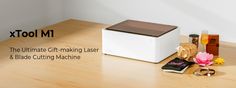 a white box sitting on top of a wooden table