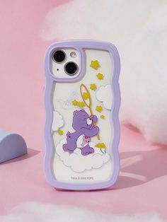 a phone case with a purple bear on it and stars in the sky behind it