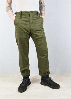 "Vintage Mens British Army Issue Work Trousers - Olive Green - Various Sizes - ADJUSTABLE Fantastic Grade A true vintage British military work pants in a mid-weight cotton blend. Tailored and flattering easy to wear design that makes them ideal for wearing day to day. We have these available in sizes 24\"-38\". Features - 1 buttoned back pocket - Wide belt loops - Zip and button fly - Waist adjusters at the side which tighten (so if unsure size up and bring in to fit) - Deep slashed side pockets Cotton Combat Pants With Straight Leg, Combat Style Cotton Straight Leg Pants, Cotton Combat Straight Leg Pants, Cotton Combat Style Full Length Pants, Combat Style Full Length Cotton Pants, Full Length Cotton Combat Pants, Cotton Combat Pants With Belt Loops, Cotton Work Pants With Welt Pockets For Outdoor, Military Style Cotton Pants