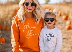 This mommy and me matching Halloween sweatshirt is the perfect way to coordinate all your little ghosts and gouls this season or get one just for you. Whether it's for Trecking trick or treaters or a casual Halloween event this sweater is cozy and universal. ideal for any situation, a unisex heavy blend crewneck sweatshirt is pure comfort. These garments are made from polyester and cotton. This combination helps designs come out looking fresh and beautiful. The collar is ribbed knit, so it retains its shape even after washing. There are no itchy side seams on these sweaters.  * 50% cotton, 50% polyester * Medium-heavy fabric (8.0 oz/yd² (271.25 g/m * Loose fit * Sewn-in label * Runs true to size You can find the matching baby body suit in our shop or at this link: https://ladybugdreambouti Fun White Sweater For Fall, White Fun Sweater For Fall, Matching Cotton Sweatshirt For Fall, Cotton Fall Sweatshirt, White Family Matching Sweatshirt For Fall, Family Matching Cotton Sweatshirt For Fall, Fall Crew Neck Sweatshirt, Halloween Sweater Outfit, Casual Halloween