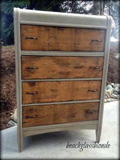 an old dresser is painted white and brown