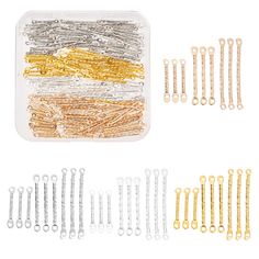 the assortment of gold and silver colored nail clips in a plastic container on a white background