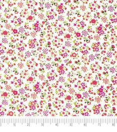 a white background with pink flowers and green leaves on the bottom half of it, as well as a ruler