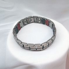 With trendy style and contemporary look, this Germanium Magnetic Bracelet is the most modish bangle in the impressive collection of Innovato Design. It is made from titanium material with link chain and toggle-clasps type. With everlasting quality and shine, this will be your longstanding fashion companion which you can don on with any of your outfit.  Wear it in all sorts of functions or ceremonies and let the attention of everyone draw to your supreme taste of choice! Besides, if you are think Trendy Bracelets, Magnetic Bracelet, Small Magnets, Trendy Style, Toggle Clasp, Link Chain, Trendy Fashion, Magnets, Bangles