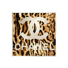 the chanel logo is shown on an animal print background