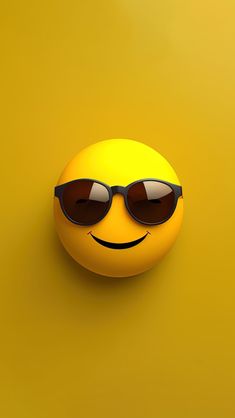 a smiley face wearing sunglasses on a yellow background