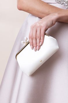 Anya Hindmarch maud pearl clutch in chalk. Recycled satin, mineral pearl closure, gold hardwareD5cm x W21cm x H15cm Fits Iphone 15 Pro Max Imported Pearl Clutch, Beach Stores, Marissa Collections, Anya Hindmarch, Resort Collection, Clutch Wallet, Clutch Handbag, Net A Porter, Iphone 15 Pro