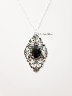 ◆ Gothic necklace with silver plated black crystal. The crystal measures 0,984252 x 0,708661 inches and is very bright, while the base measures 1,9685 x 3,14961 inches the jewel is embellished with a cameo with Victorian decorations. All necklaces in my shop are adjustable in length, but if you have demanding details you can safely contact me! ❤ The product is handmade with great care. ♡ In my shop there are many handmade jewelry for sale for all tastes, come and look at them you are welcome! ♡ Gothic Filigree Necklace For Wedding, Gothic Filigree Wedding Necklace, Gothic Wedding Necklace With Filigree Detail, Gothic Antique Silver Filigree Jewelry, Antique Silver Gothic Filigree Jewelry, Antique Silver Gothic Jewelry With Filigree, Gothic Sterling Silver Filigree Jewelry, Gothic Filigree Pendant Jewelry, Gothic Filigree Necklaces For Gifts