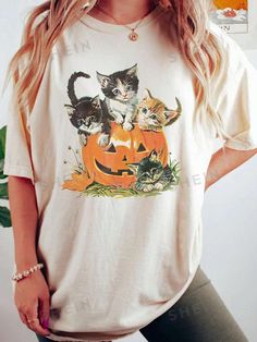 Style:Casual \nHem Shaped:Regular \nSleeve Type:Drop Shoulder \nColor:Apricot \nPattern Type:Animal \nPattern Type:Halloween \nPattern Type:Fruit&Vegetable \nPattern Type:Plants \nNeckline:Round Neck \nSleeve Length:Short Sleeve \nLength:Long \nFit Type:Regular Fit \nFabric:Slight Stretch \nMaterial:Knitted Fabric \nComposition:95% Polyester \nComposition:5% Elastane \nCare Instructions:Machine wash, do not dry clean \nSheer:No \n Nursing Student Shirts, Autumn T Shirts, Plus Size Halloween, Cat Halloween, Cat Sweatshirt, Women Halloween, Pumpkin Shirt, Halloween T Shirt, Nursing Shirts