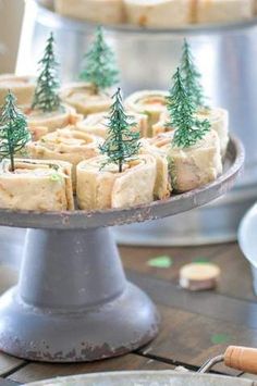 there are many small trees on top of this dessert plate, and it is ready to be eaten