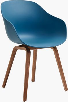 a blue chair with wooden legs on a white background, it appears to be in the shape of an egg