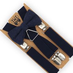 This beautiful Navy bow tie & suspenders set is a perfect choice for a holiday, wedding, groomsmen, best man, ring bearer outfit, birthday celebration or any other special occasion! SIZING:   Х-SMALL: 6mo-4yrs  * Bow Tie: 4 in wide  * Suspenders: Adjustable from 16" to 27" (38 cm - 68 cm), X- back. SMALL: 5yrs-10yrs  * Bow Tie: 4 in wide * Suspenders: Adjustable from 20" to 32" (50 cm - 85 cm), X- back. MEDIUM: 10yrs-18yrs (up to 5'6") * Bow Tie: 4.5 in wide * Suspenders: Adjustable from 24" to Elegant Party Belt With Bow, Bow Tie And Suspenders Set For Father's Day Party, Adjustable Bow Tie For Suit As Gift, Adjustable Bow Tie For Gifts, Adjustable Bow Tie Back Belt For Wedding, Adjustable Belts And Suspenders For Father's Day Gift, Adjustable Belts And Suspenders As Father's Day Gift, Adjustable Wedding Belt With Bow Tie Back, Adjustable Bow Tie For Groom