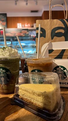 starbucks coffee and cake on a table in a restaurant