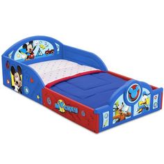 mickey mouse toddler bed with blue sheets and red trimmings on the bottom