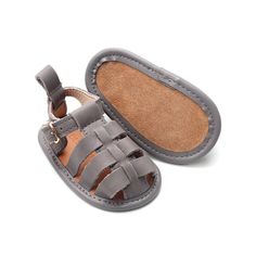 ***Looking for a larger size? Click HERE to see this same style with larger sizes in a hard sole.*** Introduce your little one to stylish comfort with our Gray Fisherman Sandals, available in US sizes 2-4. These adorable sandals are perfect for early walkers, combining the classic fisherman design with a soft sole for maximum comfort and flexibility. Crafted from genuine leather, they offer a delightful blend of style, quality, and ease of wear. Key Features: Classic Design: The timeless fisherm Gray Non-slip Flat Sandals, Non-slip Flat Gray Sandals, Gray Non-slip Sandals With Round Toe, Gray Non-slip Round Toe Sandals, Non-slip Synthetic Round Toe Sandals, Synthetic Sandals With Soft Sole And Round Toe, Non-slip Synthetic Sandals With Round Toe, Gray Non-slip Synthetic Sandals, Playtime Sandals With Soft Sole