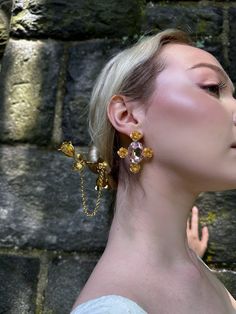 European Island vibes sparkle in our new Capri Rose Earrings featuring juicy Swarovski set stones with petite golden roses. Choose from luscious rose or crystal and instantly upgrade any ensemble. 14K Plated Gold, Swarovski Stones. Made in NYC. Gold-plated Flower Earrings For Party, Gold Plated Flower Earrings For Party, Rose Gold Cubic Zirconia Flower Earrings For Party, Gold Crystal Earrings With Jewels, Luxury Flower Drop Earrings For Party, Gold Crystal Flower Earrings For Party, Rose Gold Single Crystal Earring For Party, Gold Crystal Flower Earrings For Wedding, Glamorous Gold Flower Earrings