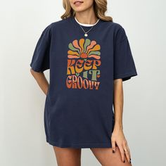 Keep It Groovy Retro floral boho Oversized Comfort Colors Shirt for women  👚THE UNISEX COMFORT COLORS C1717 SHORT SLEEVE TEE👚 🔹Features: * Unisex sizing * Made from 100% ring-spun cotton * Comfortable, relaxed fit * Twill label sewn inside * Medium weight fabric (6.1 oz/yd² or 206.8 g/m²) Want the popular oversized dress look by ordering two sizes up from your regular size. 📏Check the sizing chart in the product photos for more details. 📋👕Easy measuring tip: Simply take your favorite shirt, lay it flat, and measure from armpit to armpit for the width, and from top to bottom for the length. Compare these measurements to those of your preferred shirt. ⏳🚚Production and Shipping -Orders are processed within 1-3 days to print and ship. Estimated shipping times are given but in almost all Cotton Tops With Funny Print In Hippie Style, Bohemian Tops With Screen Print And Relaxed Fit, Bohemian Multicolor Top With Screen Print, Hippie Style Short Sleeve Top With Vintage Print, Hippie Crew Neck Top With Relaxed Fit, Hippie Crew Neck Relaxed Fit Top, Hippie Style Crew Neck Top With Relaxed Fit, Hippie Relaxed Fit Crew Neck Top, Bohemian Tops With Vintage Print And Relaxed Fit