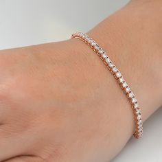 Women's bracelet features round cut lab grown diamonds set in solid 14k yellow gold.  Bracelet measures 7". Flexible Bracelet, Diamond Tennis Necklace, Diamond Tennis Bracelet, Tennis Necklace, Diamond Settings, Broken Chain, Tennis Bracelet Diamond, Matching Band, Screw Back Earrings