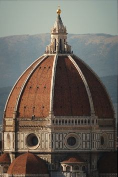 the dome of an old building with many windows