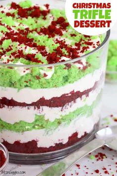 christmas trifle dessert in a glass dish with red and green sprinkles