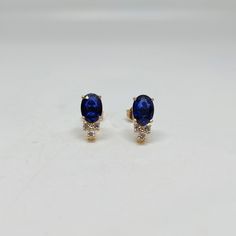 Band : Goldsmith Jewellers Material : 14k Gold Gemstone : Natural Blue Sapphire, Diamond Blue Sapphire Stone Wight : 2.10 Karat, Stone Size : 7 x 5 mm Diamond Stone Wight : 0.14 Karat, Stone Size : 1.70 mm Earring Wight : 1.790 Gm Stone Shape : Oval, Round Band Color : Gold Made to Order Please Give Your Opinion or Feedback About The Product This Earring You can be Put All Stones of Your Choice. Also Available in 14k White Gold, 14k Rose Gold and 925 Starling Silver https://www.etsy.com/in-en/yo Blue Diamond-accented 14k Gold Earrings, Blue Diamond Accent Earrings In 14k Gold, Blue Diamond Accent 14k Gold Earrings, Blue Oval 14k Gold Earrings, Oval Blue 14k Gold Earrings, Oval 14k Gold Earrings With Diamond Accents, Hallmarked Sapphire Earrings For Anniversary, Blue Oval Hallmarked Earrings, Formal Hallmarked Sapphire Earrings