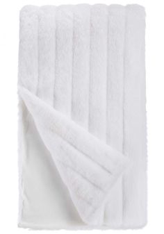 six white towels folded on top of each other