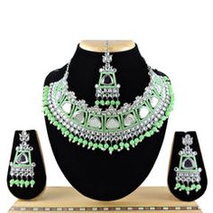 Gold Rodium Polish Green color Necklace in Metal Alloy studded with CZ Diamond, Pearl Silver Necklace Designs, Indian Wedding Jewelry Sets, Wear Pearls, Black Choker Necklace, Yellow Necklace, Wedding Jewellery Collection, Color Necklace, Studded Necklace, Choker Necklace Set