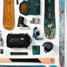 snowboard equipment laid out on top of each other