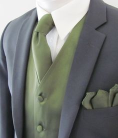 a close up of a suit and tie on a mannequin