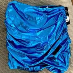 In Awesome Condition, A Never Worn Blue Metallic Skirt From Fashion Nova. Blue Skirt For Night Out, Blue Lined Mini Skirt For Night Out, Blue Lined Skirt Bottoms For Night Out, Blue Mini Length Party Bottoms, Blue Stretch Skirt For Party, Stretch Blue Skirt For Party, Light Blue Lined Skirt For Party, Blue Lined Skirt For Party, Blue Mini Skirt For Party