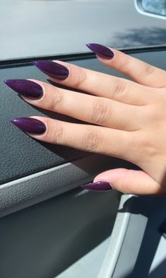 Dark Purple Oval Acrylic Nails, Almond Acrylic Nails Dark, Dark Acyrilics Nails, Dark Pointy Nails, Sharp Purple Nails, Dark Purple Aesthetic Nails, Dark Purple Witchy Nails, Dark Purple Nails Almond Shape, Nails For A Dark Purple Dress