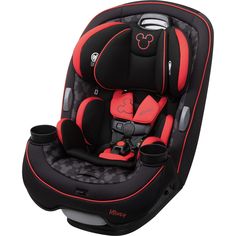 the child's car seat is black and red with mickey mouse symbols on it