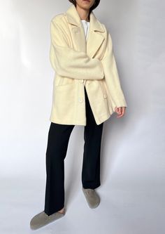 90s Cream wool coat. Features 2 front pockets, double breasted fastening, which has an oversized feel and a relaxed style.  Size - S/M / UK 8-12 / US 4-8 / EU 36-40. Label reads UK 12 Model is 5'4 and a size UK 6-8.  Bust circ: 116cm / Length: 78cm /  Sleeve length: 58cm 100% Pure New Wool. Very good condition. Made by 'Classic Woman' Found in the UK, based in London. Oversized Wool Pea Coat With Button Closure, Oversized Wool Outerwear In Winter White, Cream Double-breasted Wool Outerwear, Oversized Beige Wool Sweater Coat, Double-breasted Cream Wool Outerwear, Classic Double-breasted Cream Pea Coat, Classic Cream Double-breasted Pea Coat, Cream Wool Double-breasted Outerwear, Oversized Wool Coat With Double-breasted Buttons